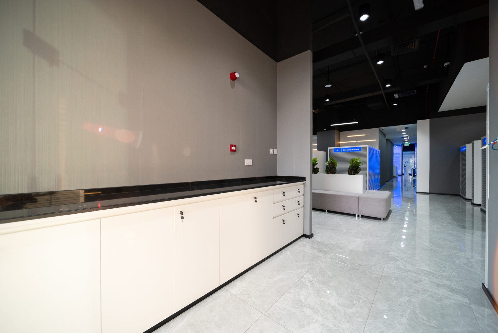Quiet legal mediation corner with acoustic wall panels and soft task lighting